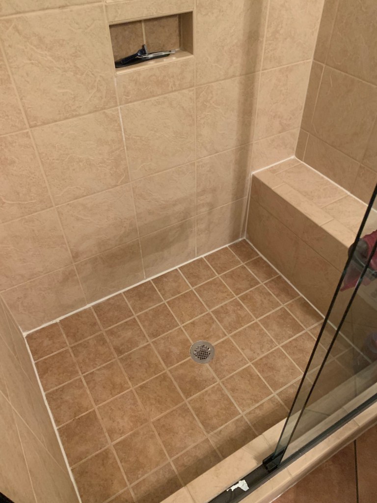 Fresh and clean caulk makes the shower more enjoyable!