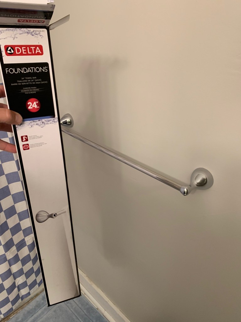 Bathroom in Garner needed a new towel rack installed.