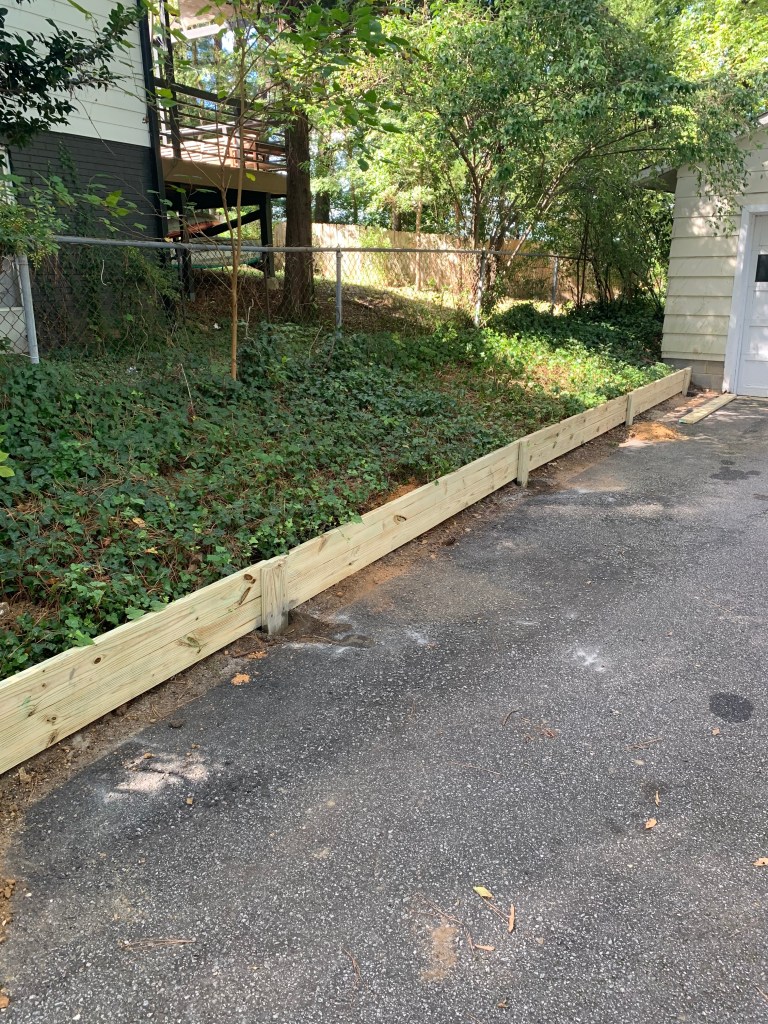 Handyman replaced rotted retaining wall in Raleigh, NC