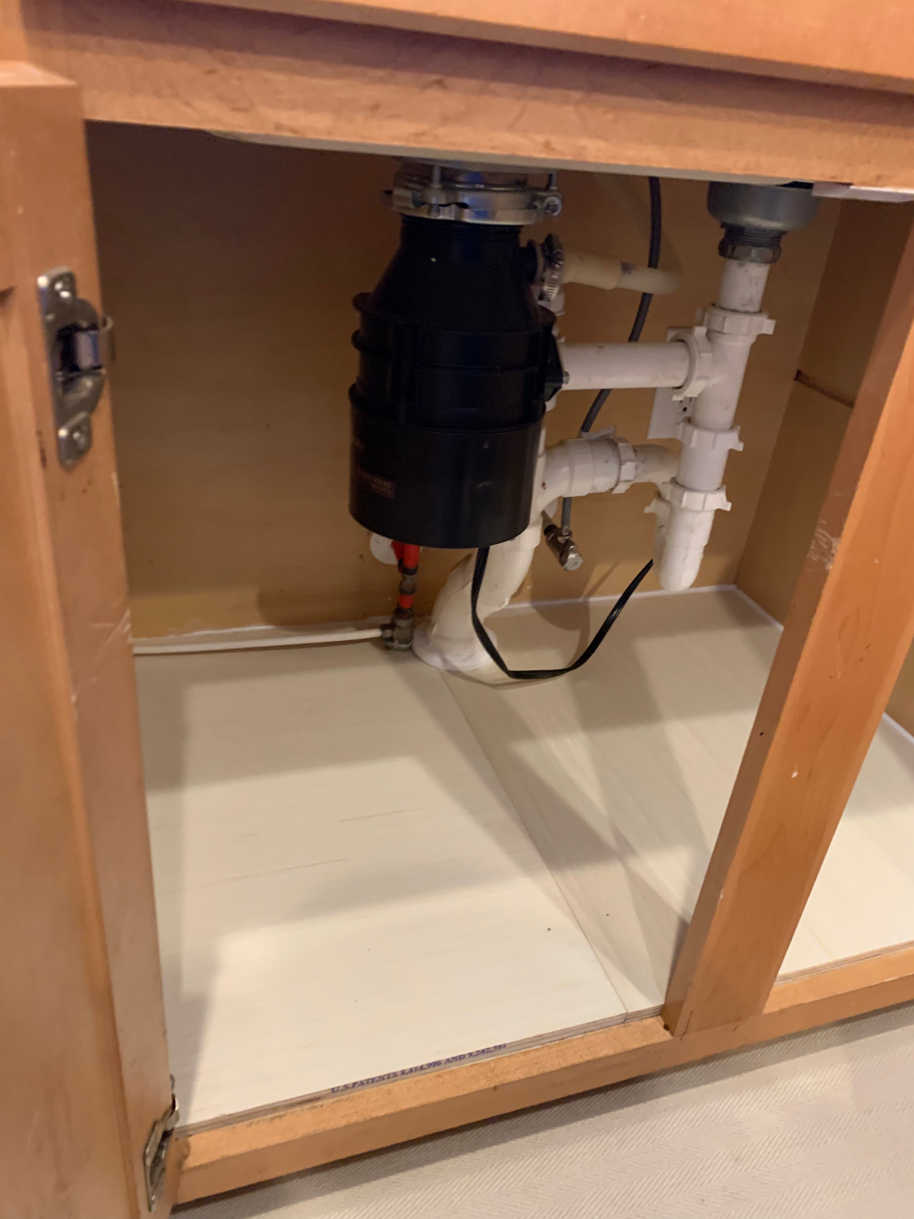 Replaced rotting kitchen sink cabinet panel for house in Cary