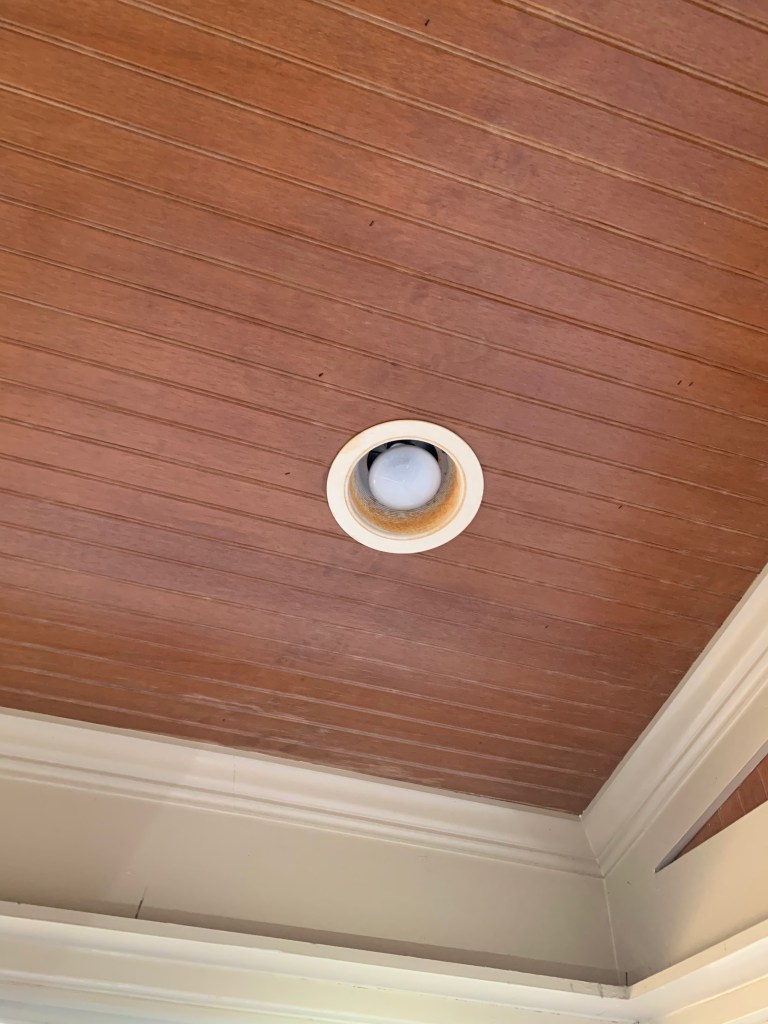 Rusting recessed can light needing handyman repairs in Apex, NC.